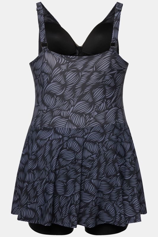 Robe de bain à bonnets souples. Décolleté rond. Matière recyclée, imprimé coquillages.