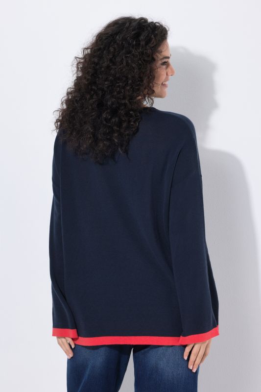 Pull à col V. Manches longues à extrémités contrastantes