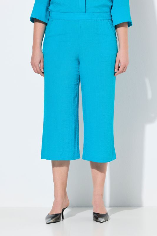 Jupe-culotte à taille élastique. Jambe large, longueur mollet