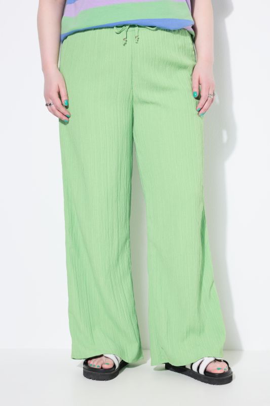 Pantalon en crêpe, jambe large et taille élastique