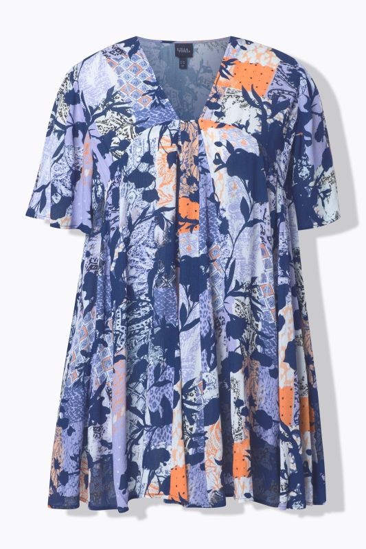 Blouse, motif animaux de la jungle. Décolleté carré et manches courtes. Coupe évasée