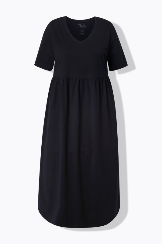 Robe maxi, coupe évasée. Décolleté V, manches courtes. Poches