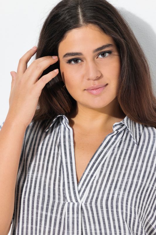 Robe oversize en lin mélangé. Rayures. Col chemise et manches courtes