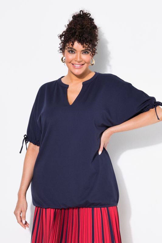 Sweat-shirt oversize. Col tunisien et manches courtes