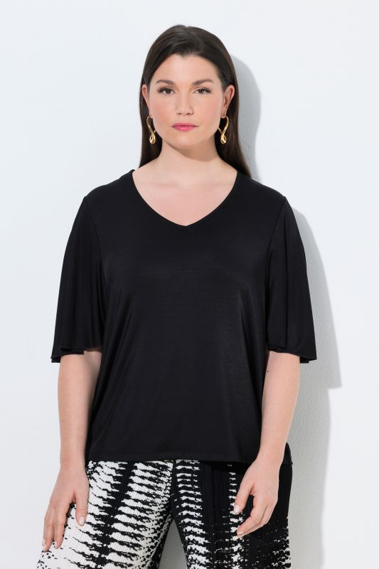 T-shirt oversize, tombé fluide, décolleté en V et manches courtes chauve-souris