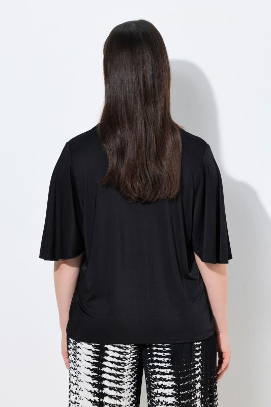 T-shirt oversize, tombé fluide, décolleté en V et manches courtes chauve-souris