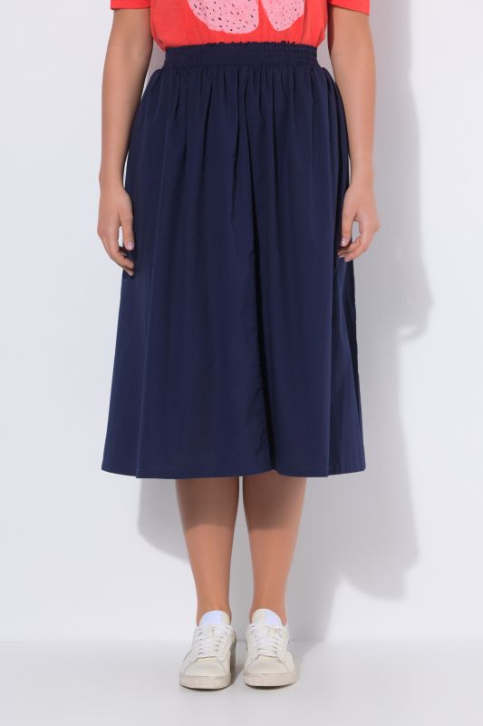 Jupe midi, matière stretch et taille élastique, coupe évasée