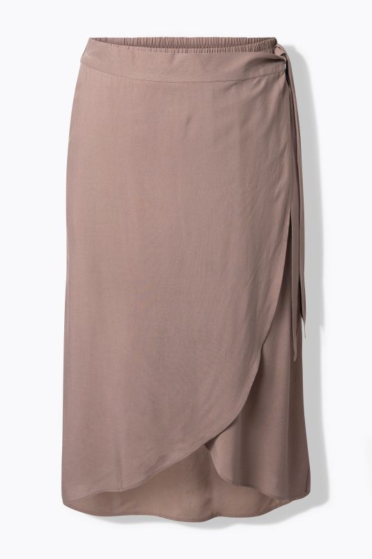 Jupe portefeuille, plus longue à l'arrière, taille élastique et coupe évasée