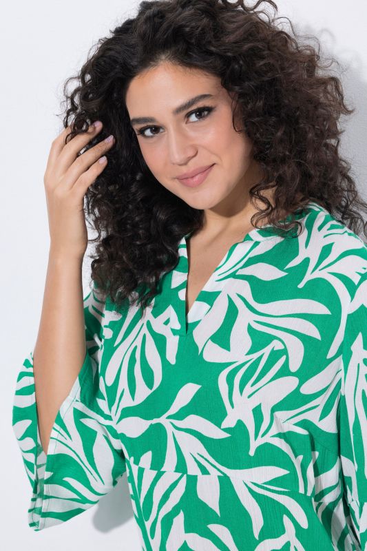 Robe midi, coupe évasée, décolleté en V et manches&nbsp;3/4