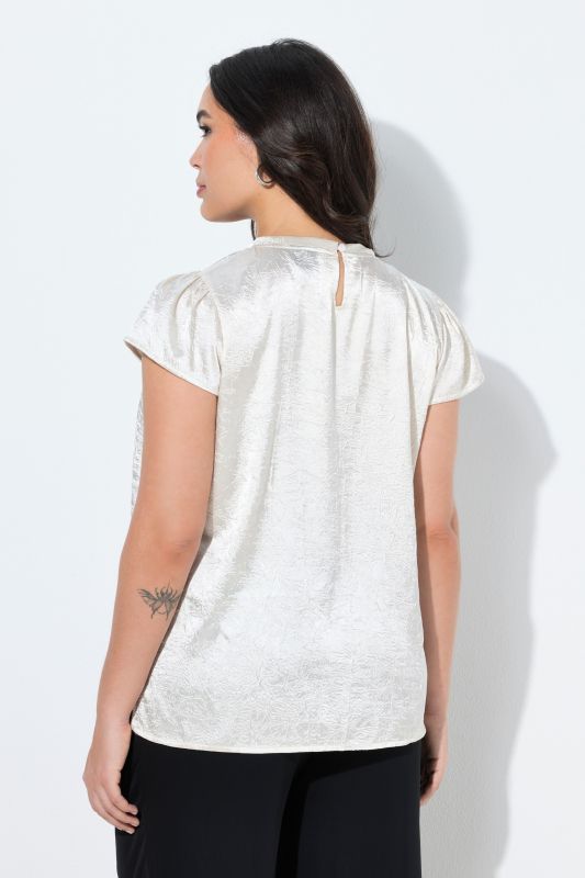 Blouse avec broche, coupe évasée et décolleté rond, manches courtes mancheron