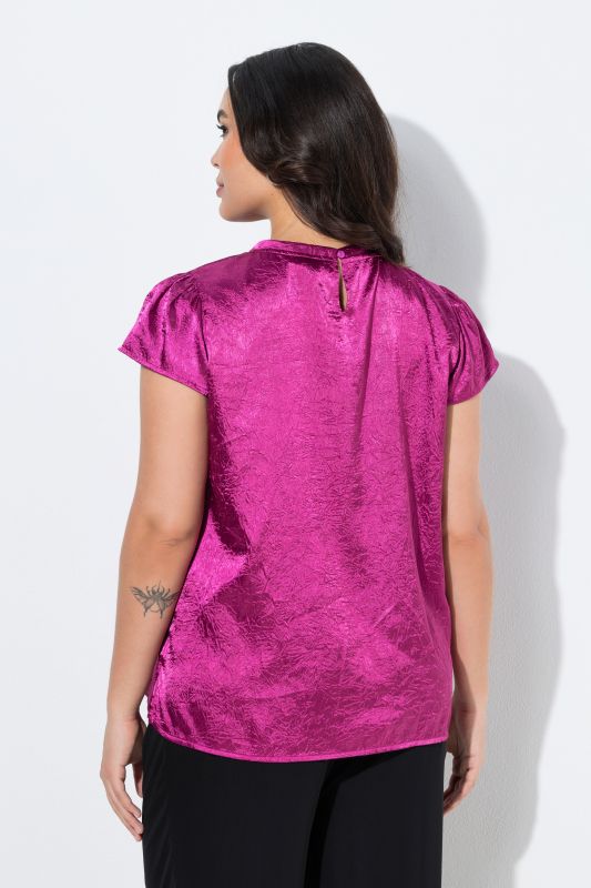 Blouse avec broche, coupe évasée et décolleté rond, manches courtes mancheron