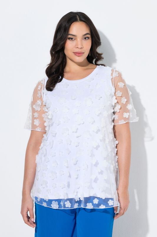 Blouse avec applications florales, décolleté rond et manches courtes