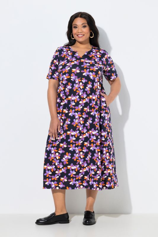 Robe maxi coupe évasée, poches, col tunisien et manches courtes