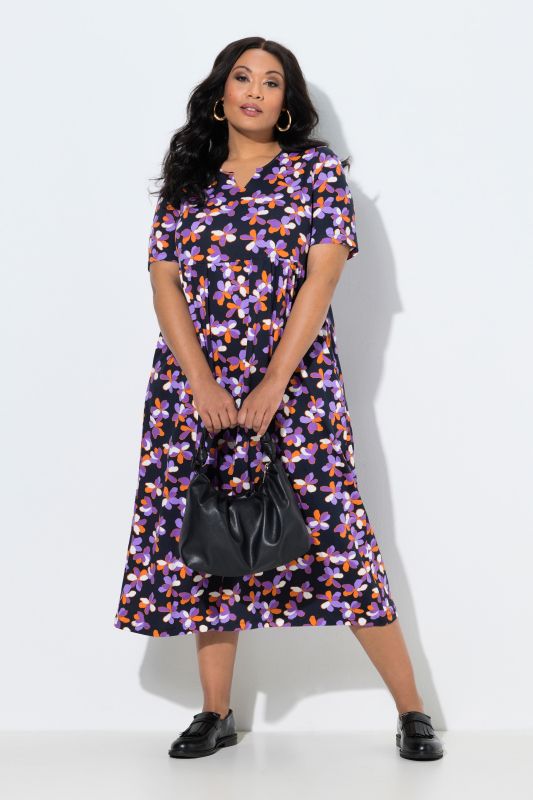 Robe maxi coupe évasée, poches, col tunisien et manches courtes