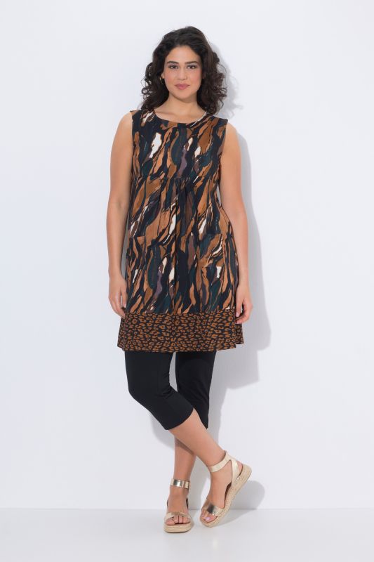 Robe en jersey sans manches, bordure contrastante à la base et décolleté rond, coupe évasée