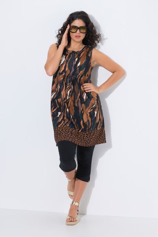 Robe en jersey sans manches, bordure contrastante à la base et décolleté rond, coupe évasée