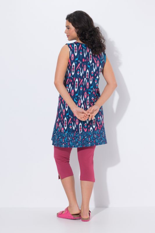 Robe en jersey sans manches, bordure contrastante à la base et décolleté rond, coupe évasée