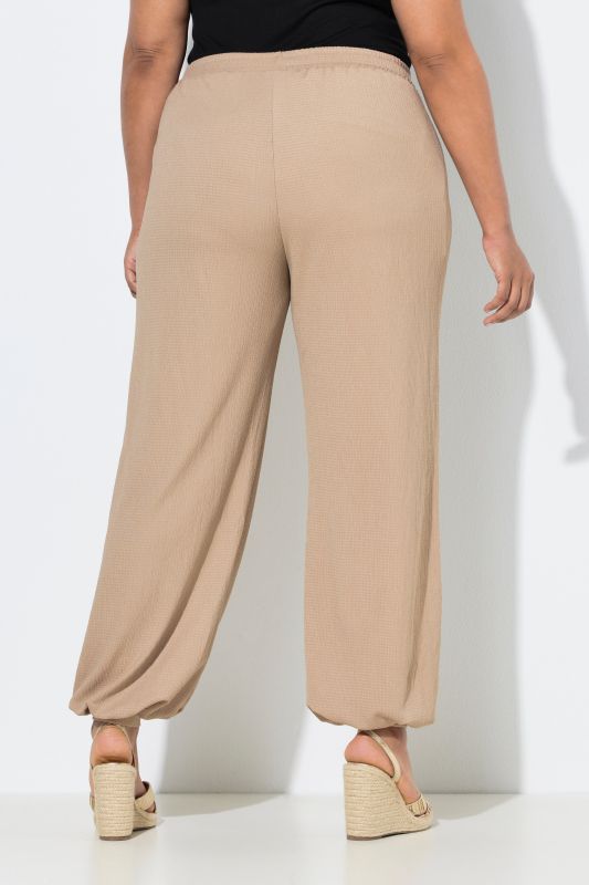 Pantalon en crêpe, jambe large et taille élastique