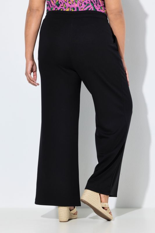 Pantalon à pinces, jambe large et taille élastique
