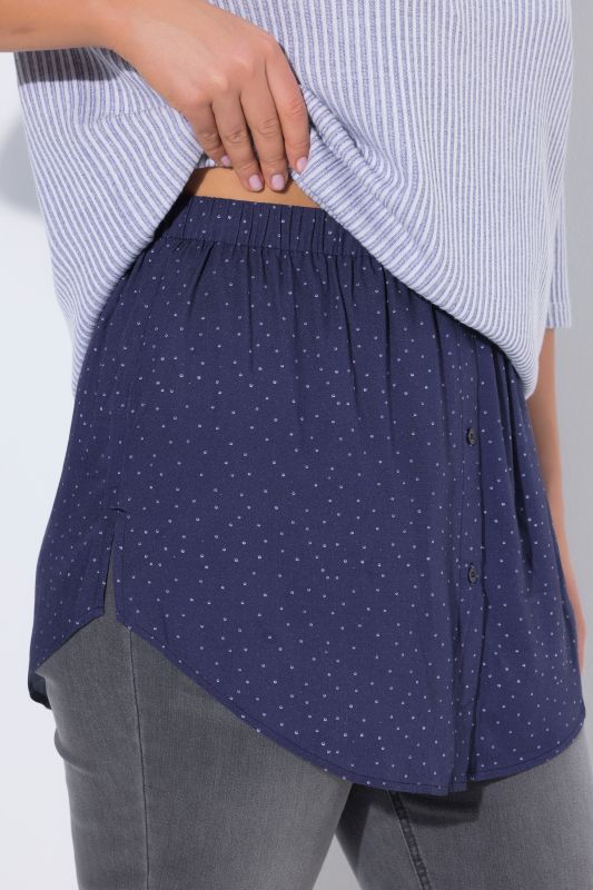 Rallonge pour chemisier, motif à pois, base arrondie et coupe évasée