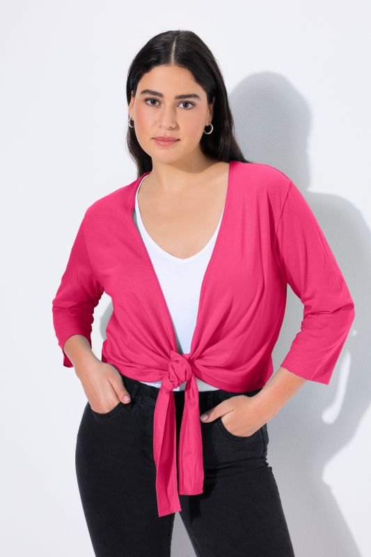 Boléro en jersey noué à la taille. Veste courte à manches 3/4