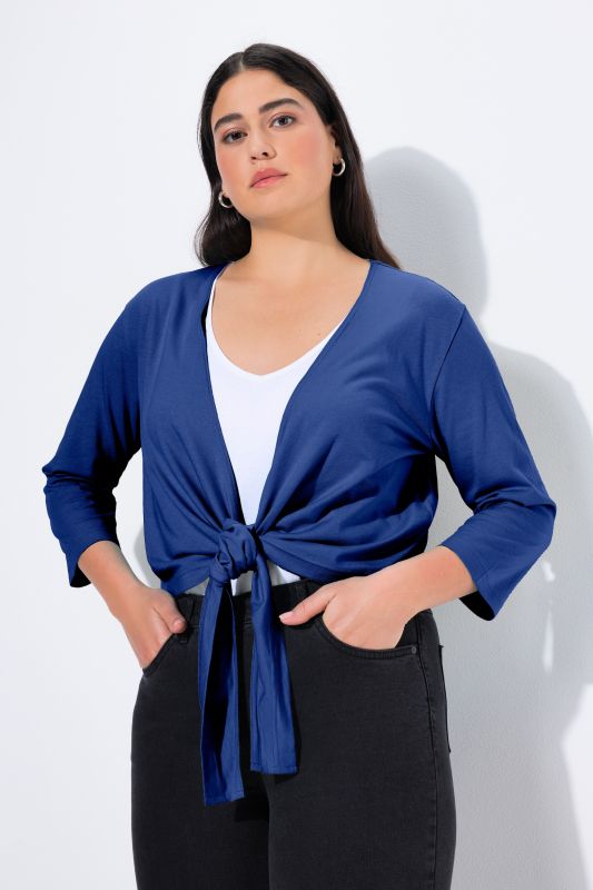 Boléro en jersey noué à la taille. Veste courte à manches 3/4