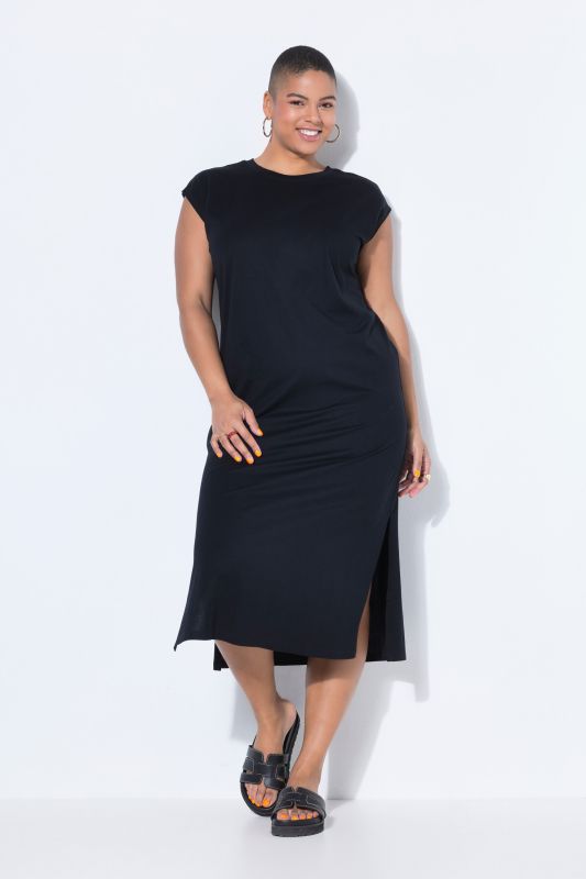 Robe midi en jersey oversized à encolure ronde et sans manches. Ouverture de type fente sur le côté