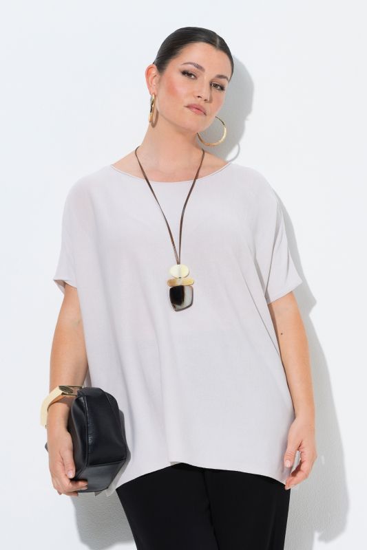 Pull oversize. Encolure bateau et manches chauve-souris