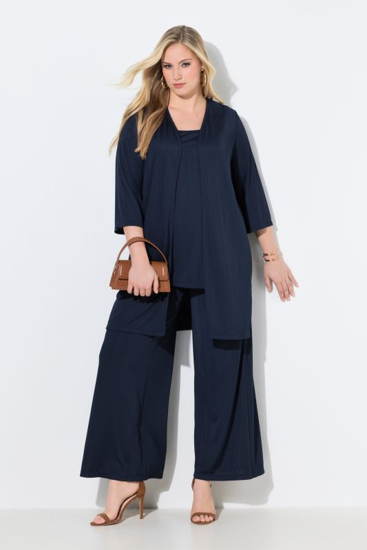 Gilet long en jersey côtelé. Coupe ouverte et encolure en V