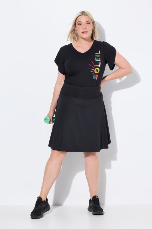 Jupe-short avec legging intégré. Taille élastique. Poches pour smartphone