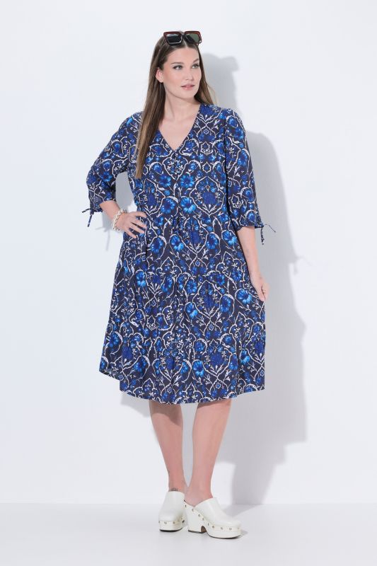 Robe midi à fleurs, poches, décolleté en V et manches 3/4