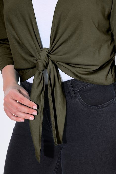 Boléro en jersey noué à la taille. Veste courte à manches 3/4