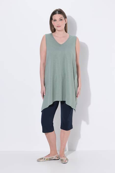 Débardeur long avec base en pointe des deux côtés. Décolleté en V. Coton bio. Coupe évasée