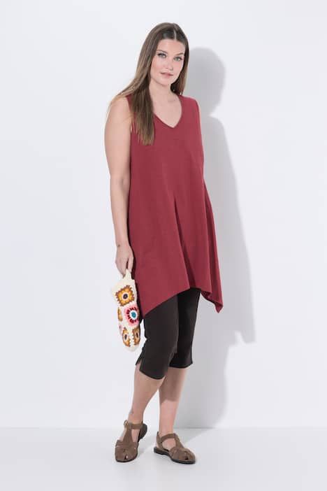 Débardeur long avec base en pointe des deux côtés. Décolleté en V. Coton bio. Coupe évasée