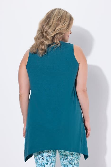 Débardeur long avec base en pointe des deux côtés. Décolleté en V. Coton bio. Coupe évasée