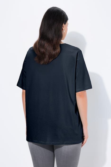 T-shirt à coupe évasée. Décolleté en V et manches courtes