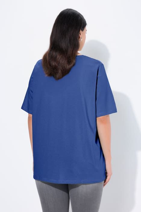 T-shirt à coupe évasée. Décolleté en V et manches courtes