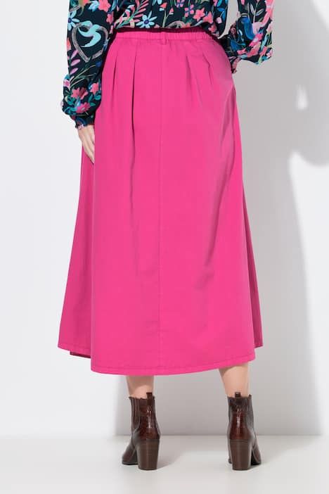 Jupe en jean, coupe évasée. Taille élastique. Boutons fantaisie