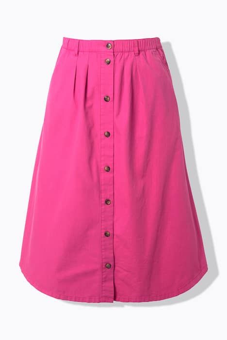 Jupe en jean, coupe évasée. Taille élastique. Boutons fantaisie