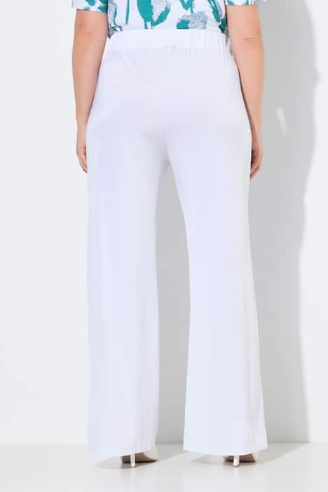 Pantalon en piqué au tombé fluide, jambe large et taille élastique