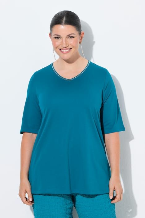 T-shirt à coupe évasée. Col en V et manches courtes