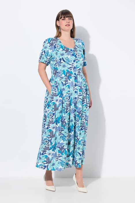 Robe maxi oversize en jersey. Décolleté rond et manches courtes. Imprimé à fleurs