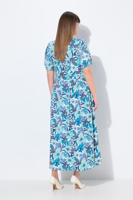 Robe maxi oversize en jersey. Décolleté rond et manches courtes. Imprimé à fleurs