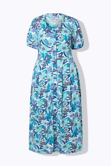 Robe maxi oversize en jersey. Décolleté rond et manches courtes. Imprimé à fleurs