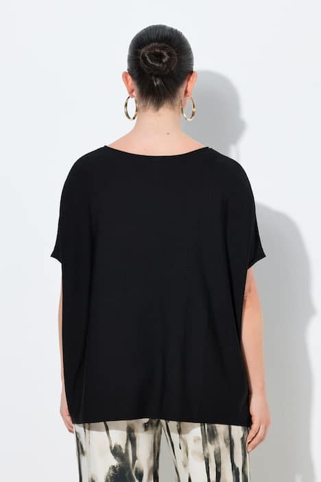 Pull oversize. Encolure bateau et manches chauve-souris