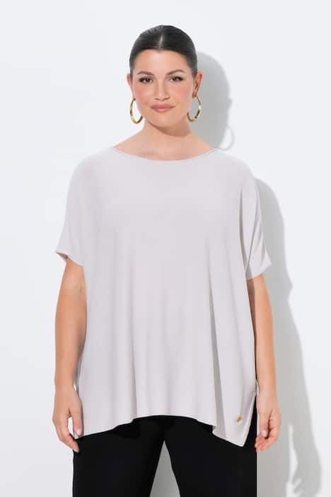 Pull oversize. Encolure bateau et manches chauve-souris