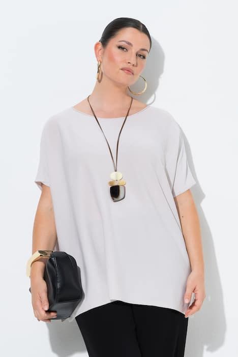 Pull oversize. Encolure bateau et manches chauve-souris