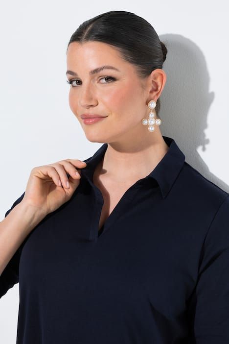 Polo à manches courtes. Coton Pima. Coupe évasée