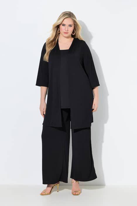 Gilet long en jersey côtelé. Coupe ouverte et encolure en V