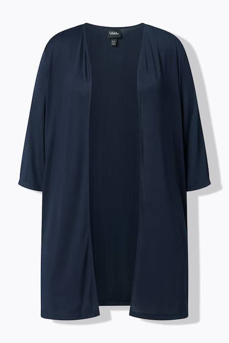 Gilet long en jersey côtelé. Coupe ouverte et encolure en V